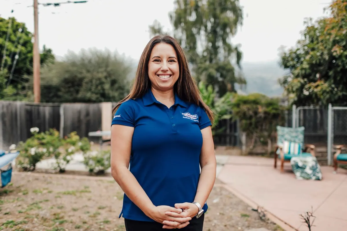 Smiling AirWorks team member in a branded polo at a Ventura County home