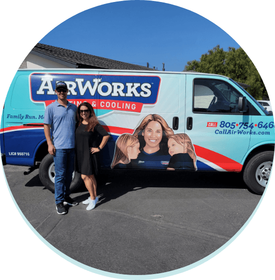 AirWorks owners standing in front of service van